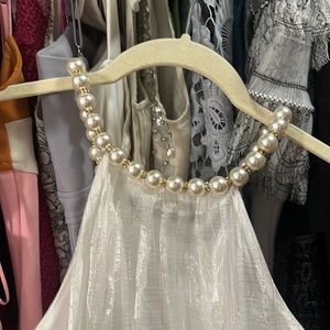 Mini dress with pearls